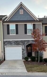 a front view of a house with yard