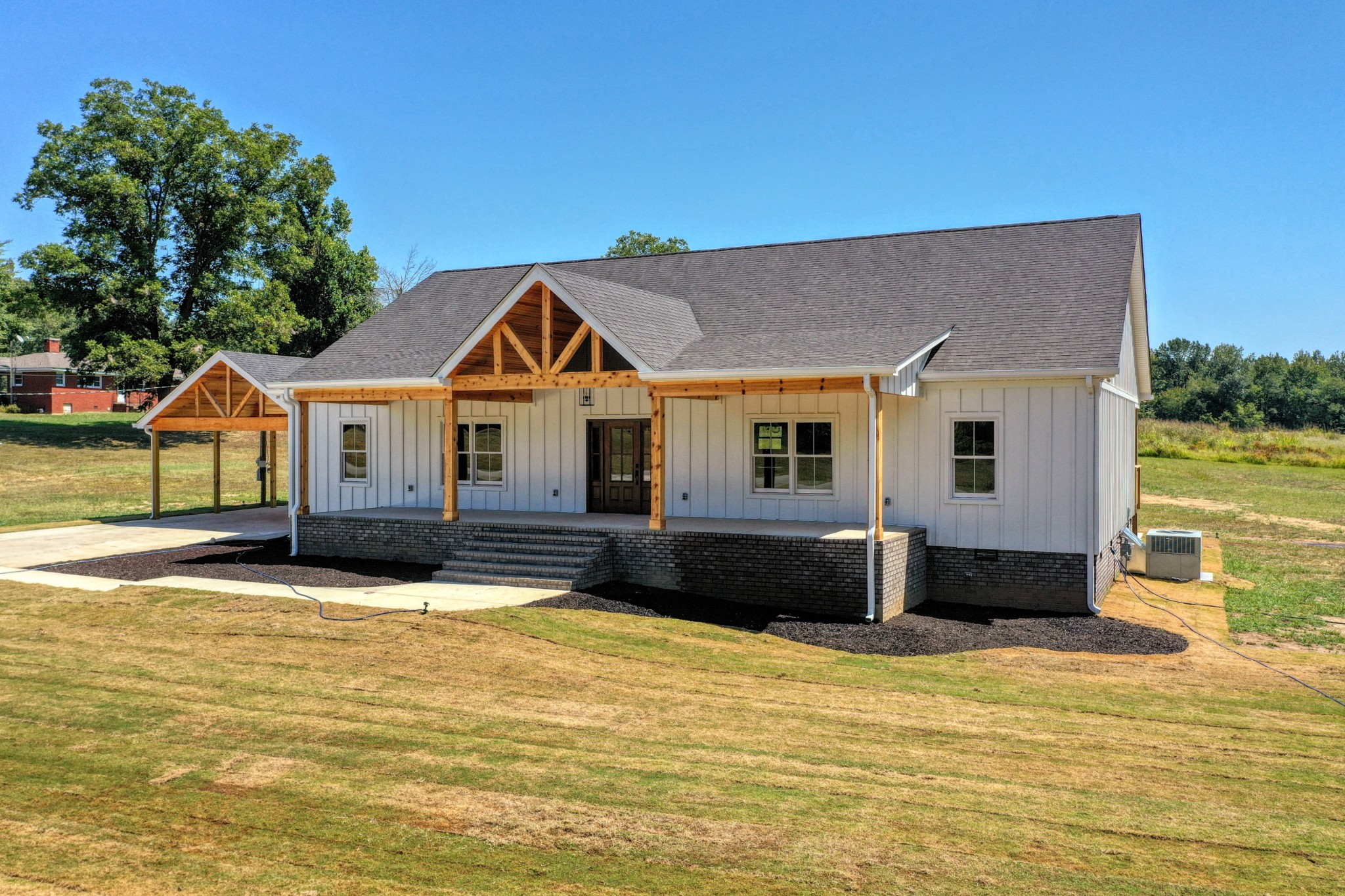 a front view of a house with a ocean view