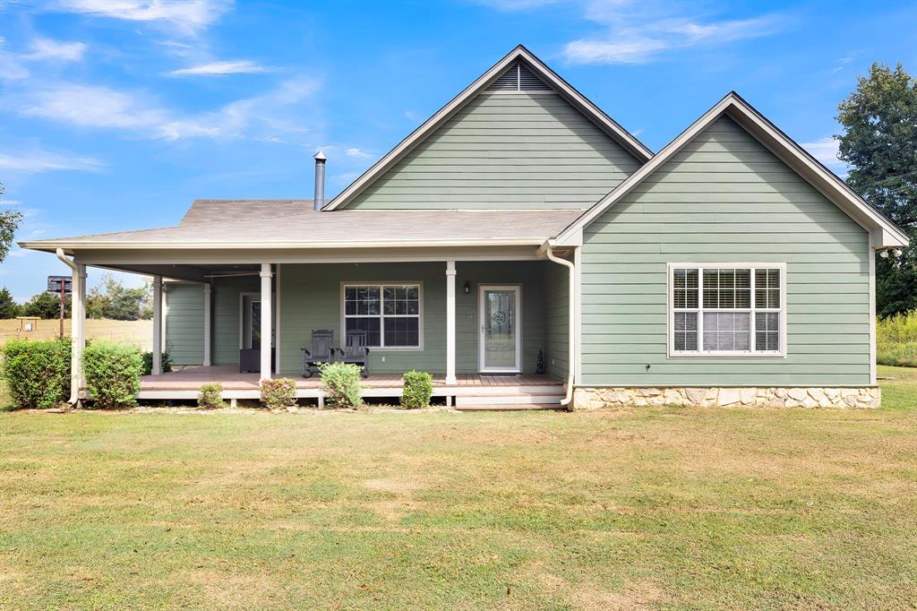 a front view of a house with a patio