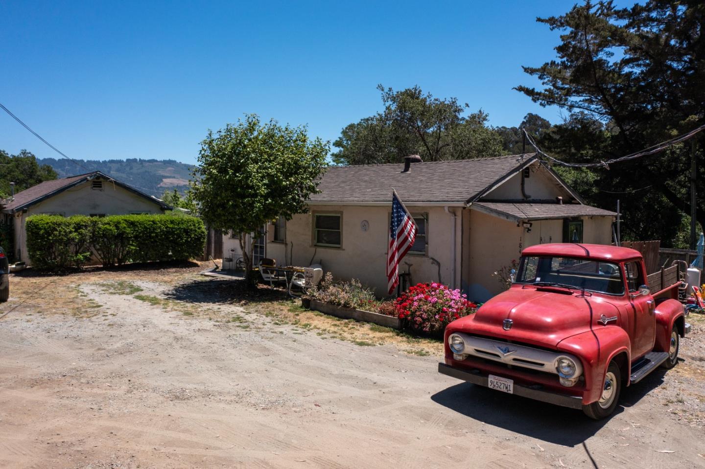 a car parked in front of a house