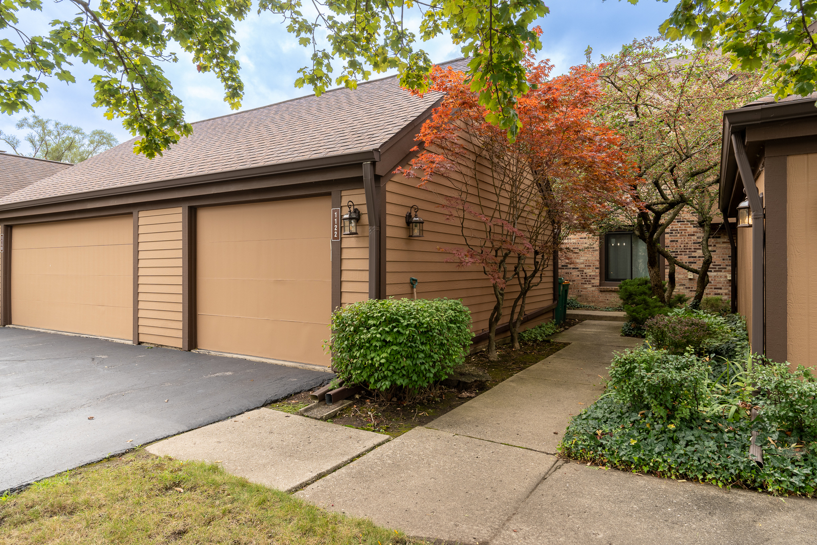 a view of a house with a garage