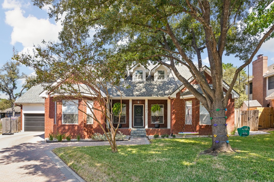 front view of a house with a yard