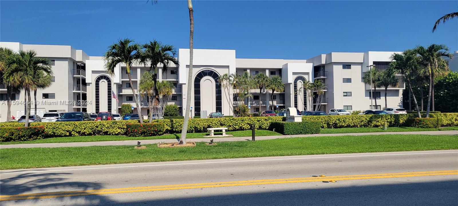 a view of a building with a yard