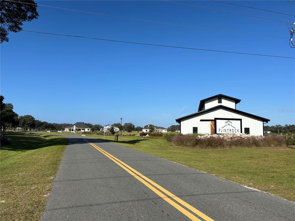 a view of ocean and yard