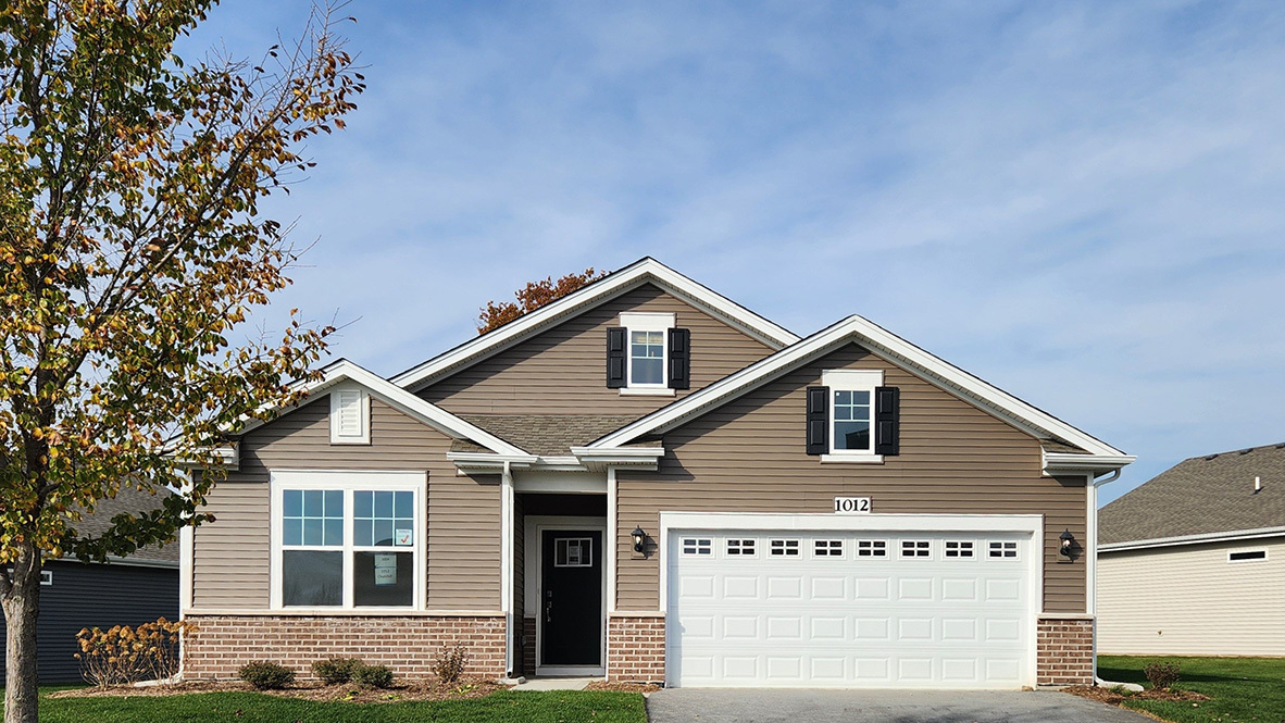 a view of front of house with a yard