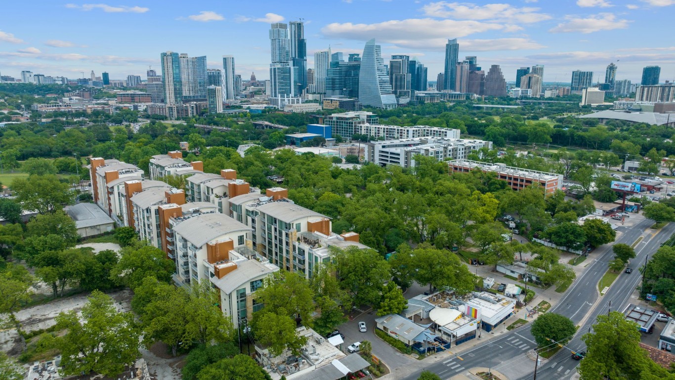 a view of a city with tall buildings