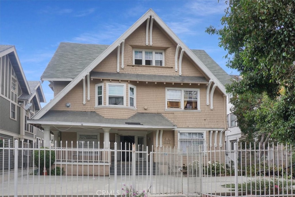 a front view of house with a yard