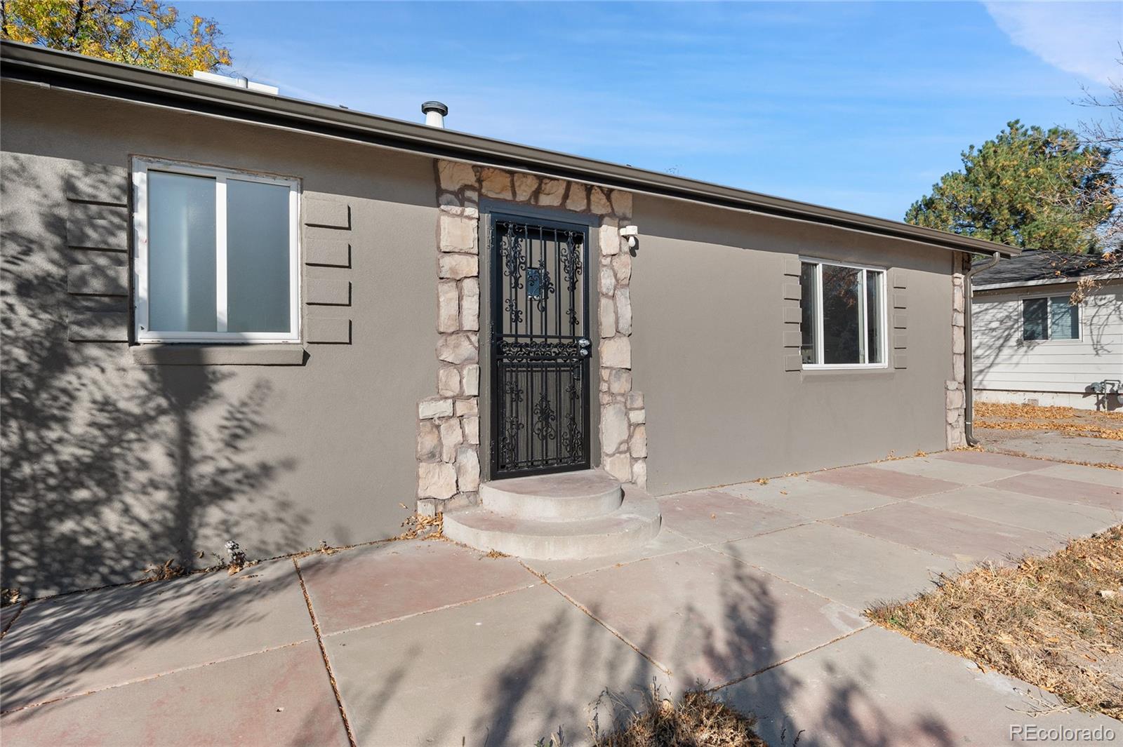 a front view of a house with a garage