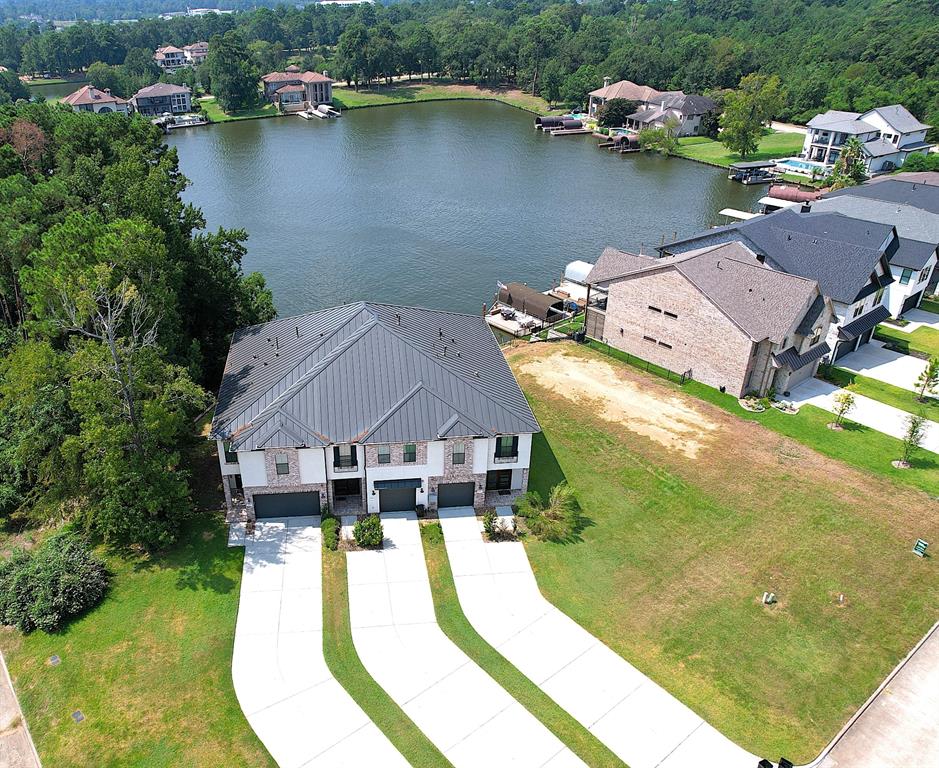 an aerial view of a house with a swimming pool