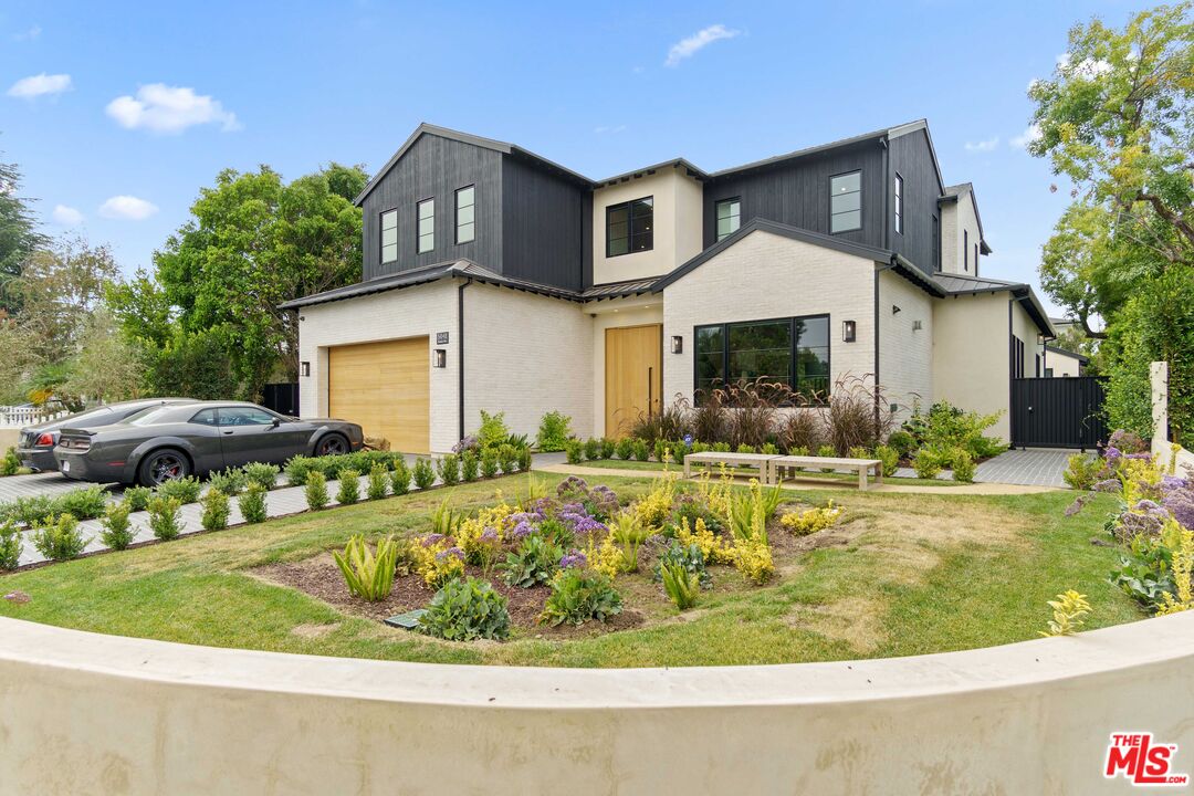 a front view of house with outdoor space