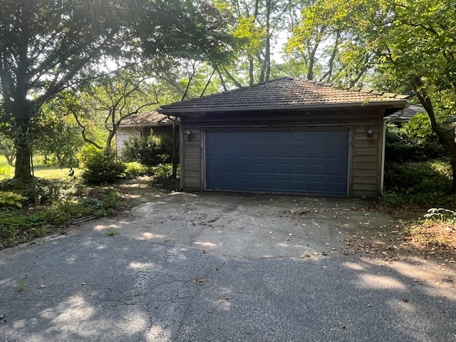 a view of a house with a garage