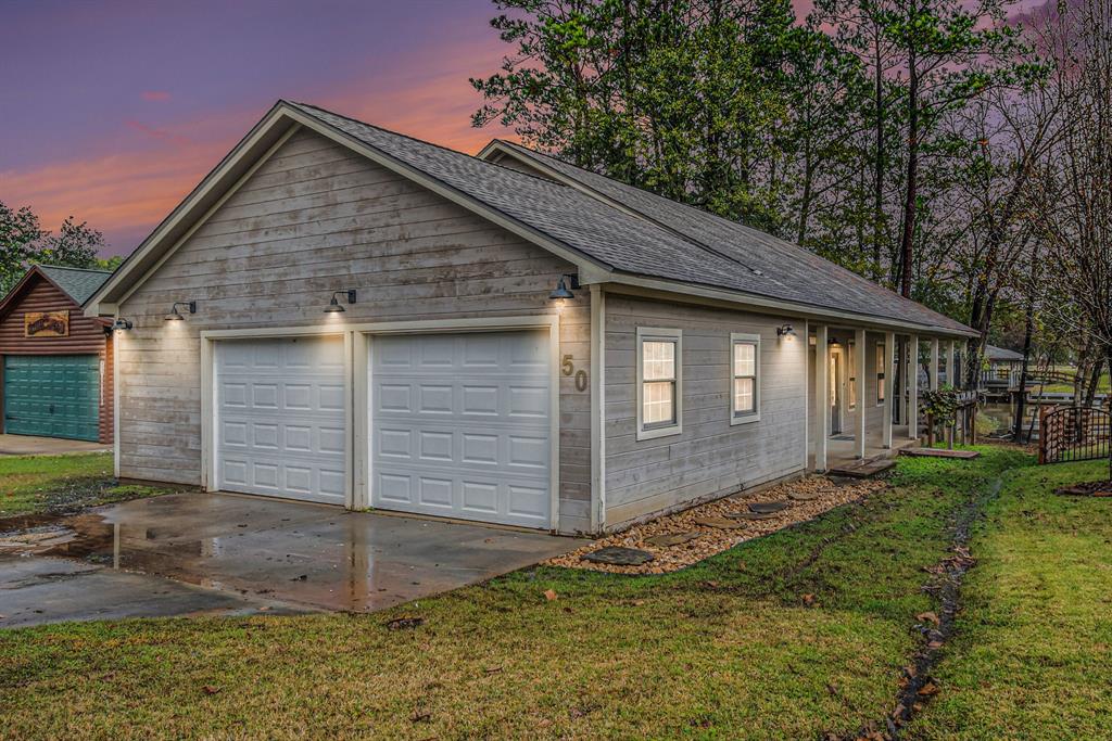 a front view of house with a yard