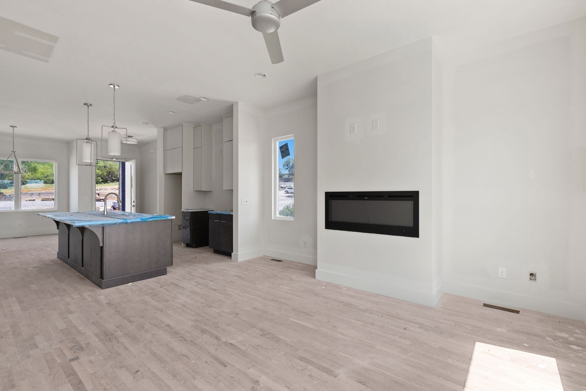 a view of kitchen with furniture and window