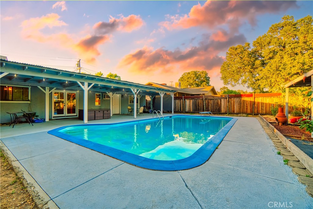 a view of a house with swimming pool