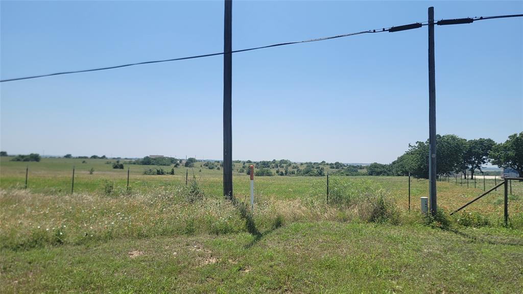 a view of a lake with a big yard