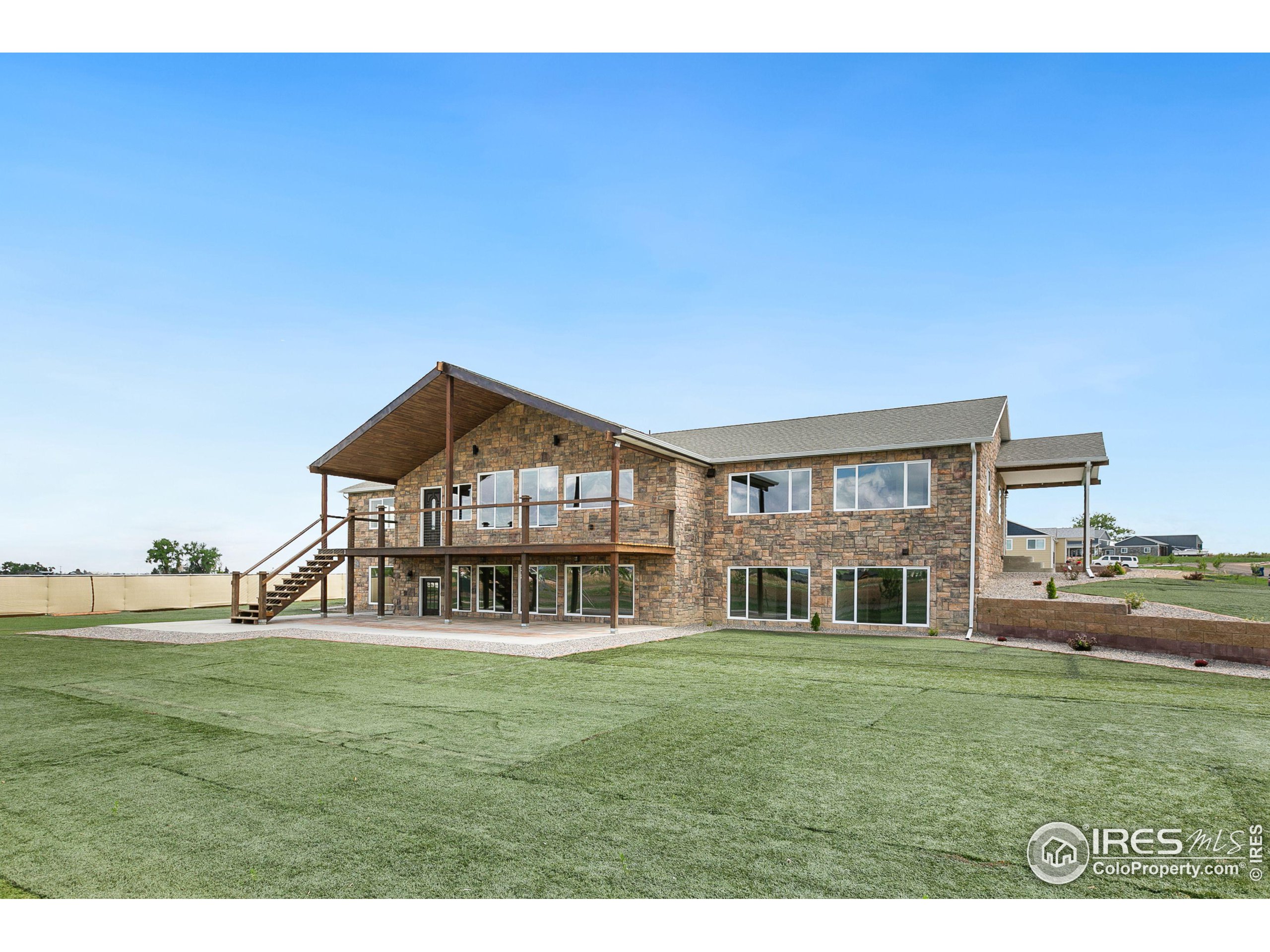 a view of a house with a big yard