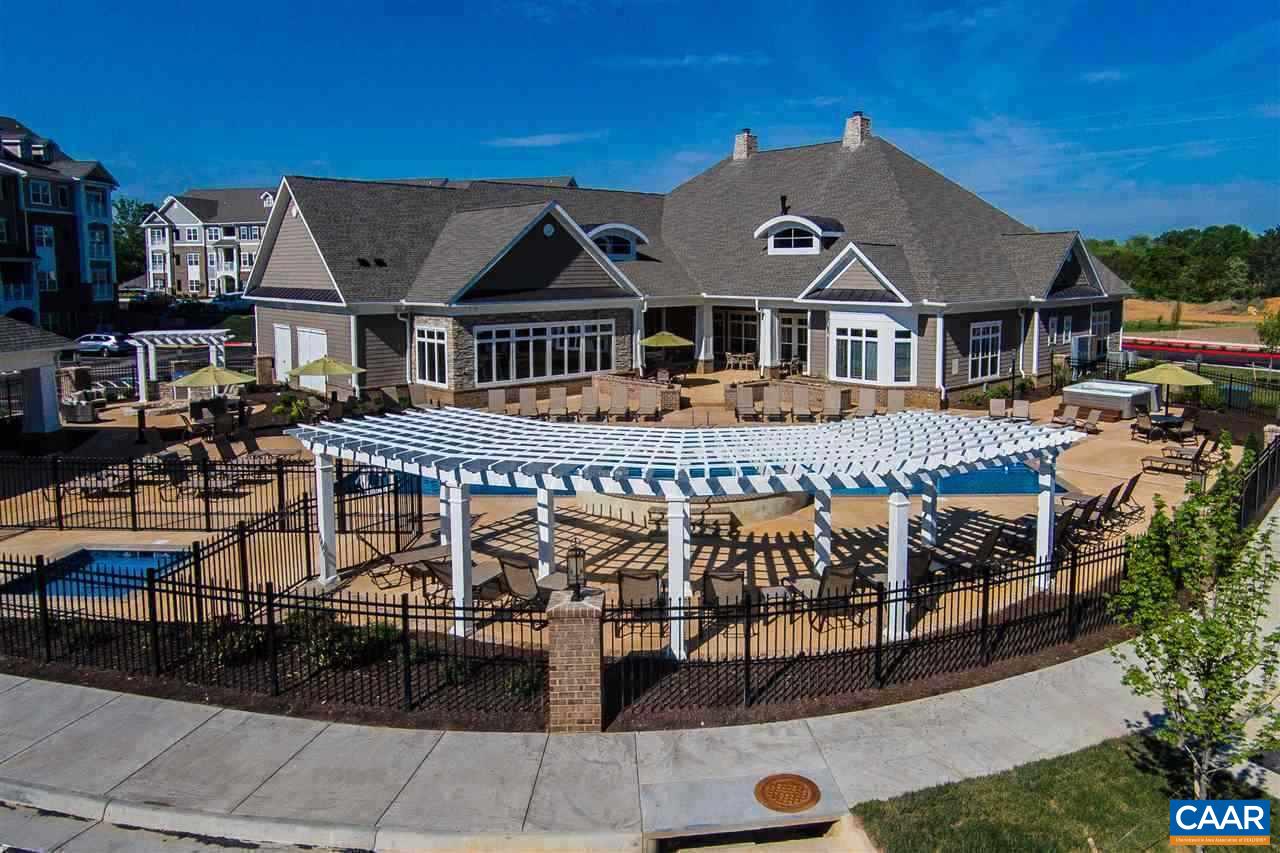 a front view of a house with swimming pool