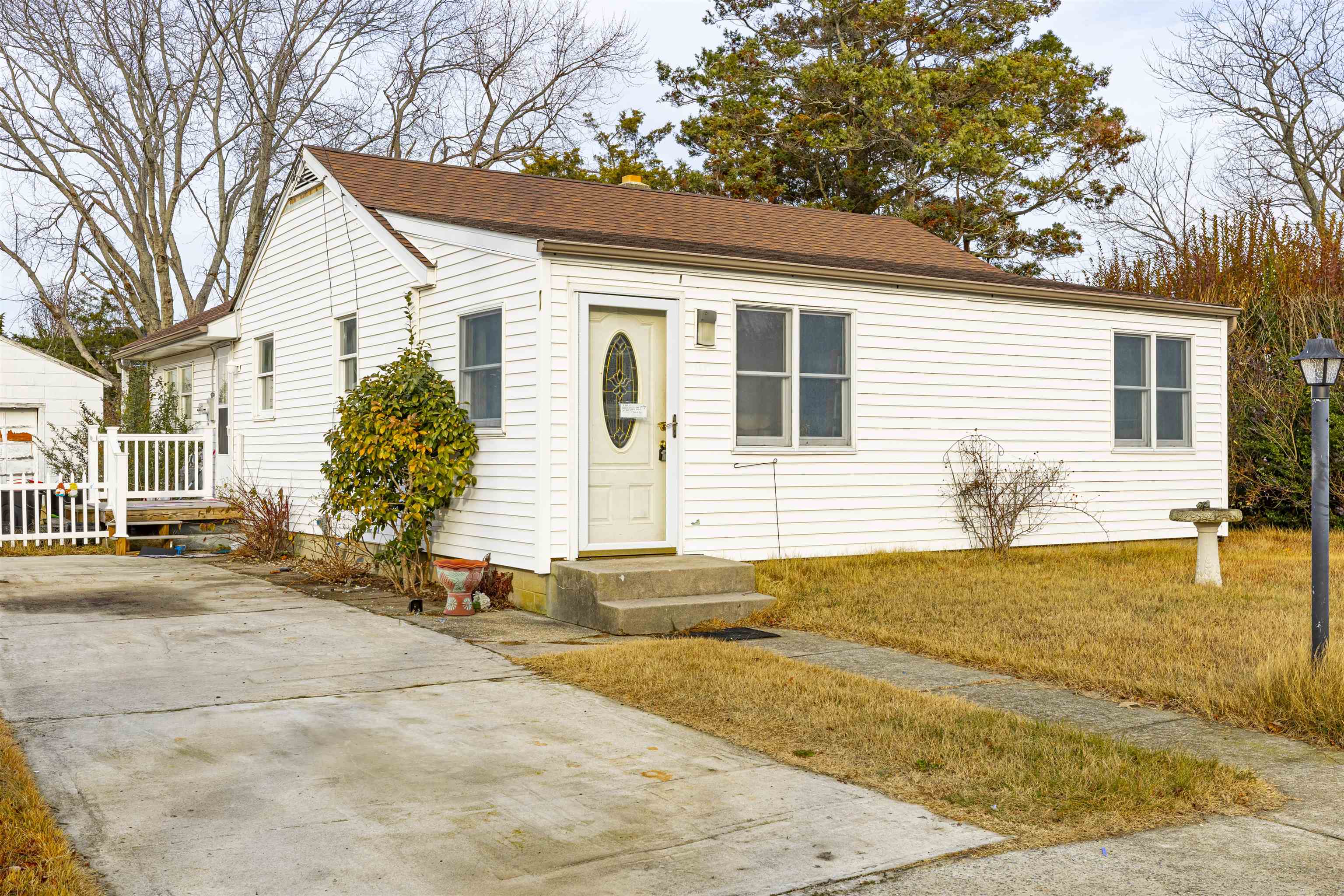 a front view of a house with yard