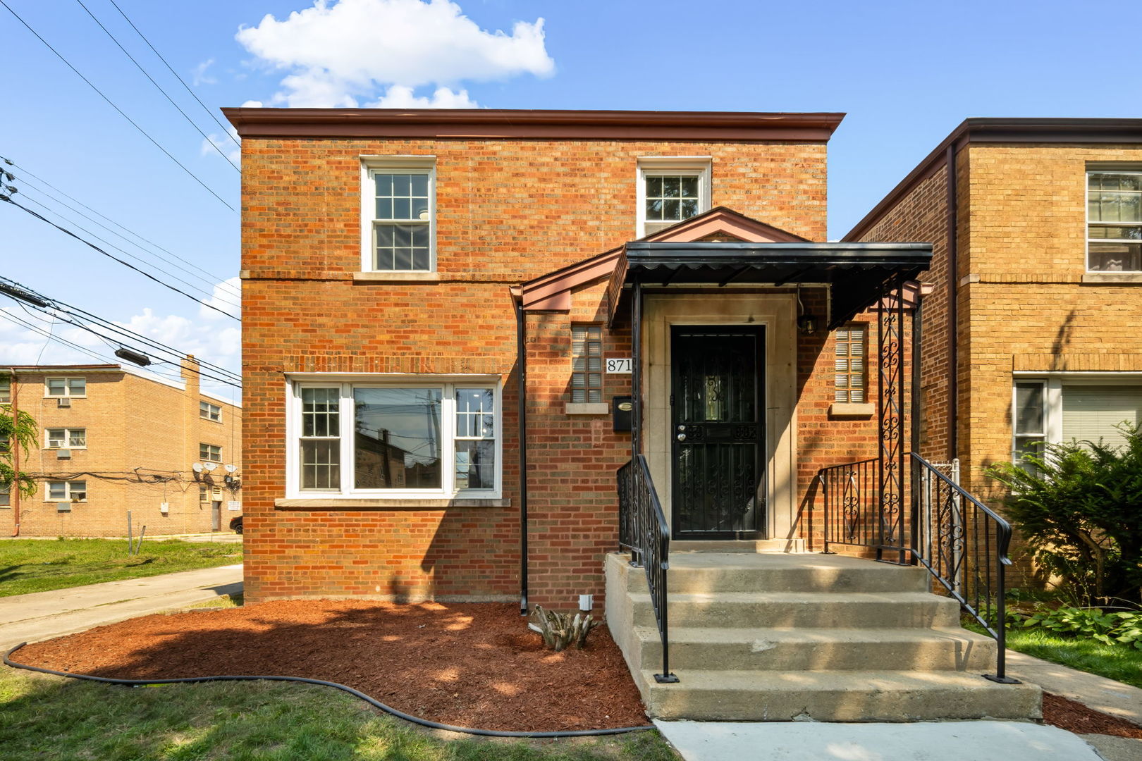 a view of a house with a patio