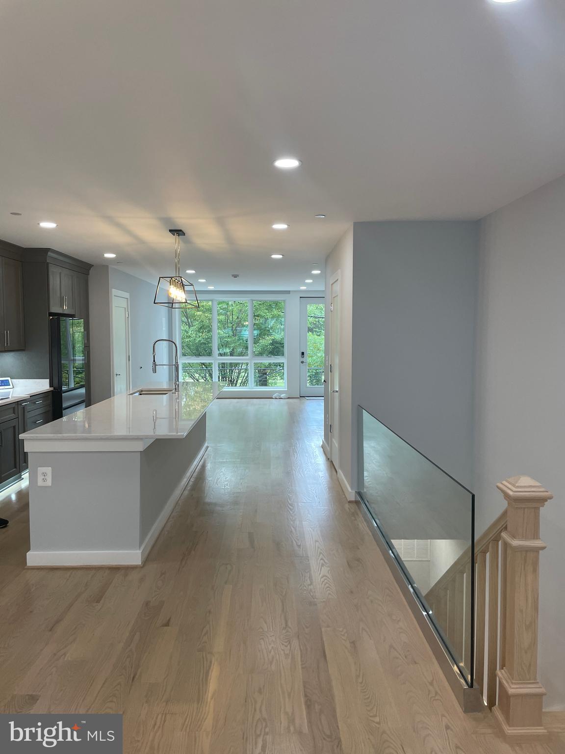 a view of kitchen with furniture and large window