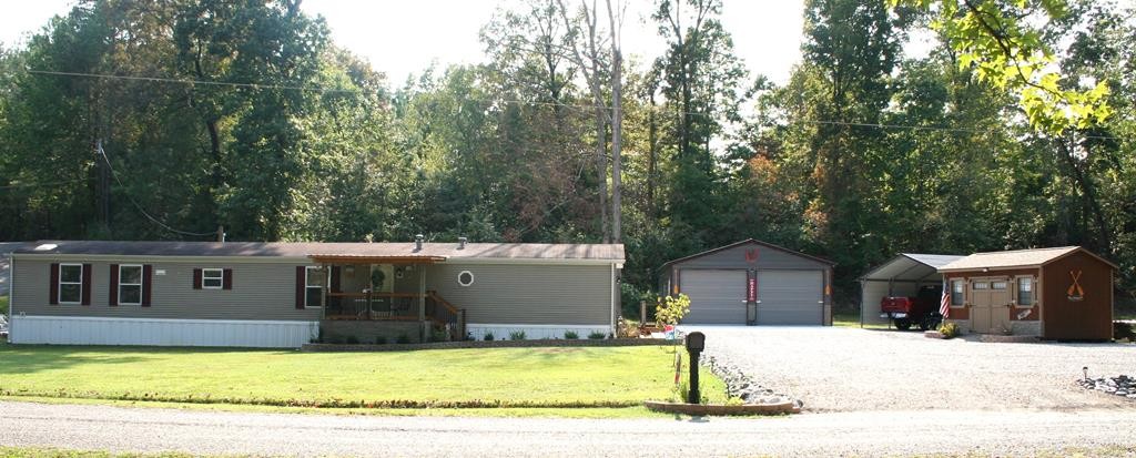 a view of a house with a swimming pool