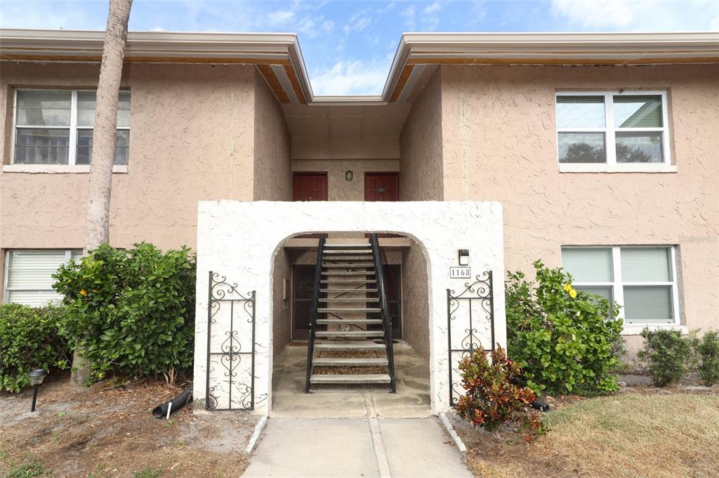 a front view of a house with a garage