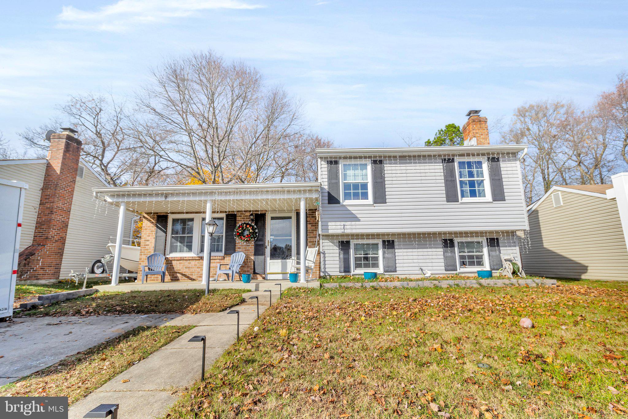 a front view of a house with a porch