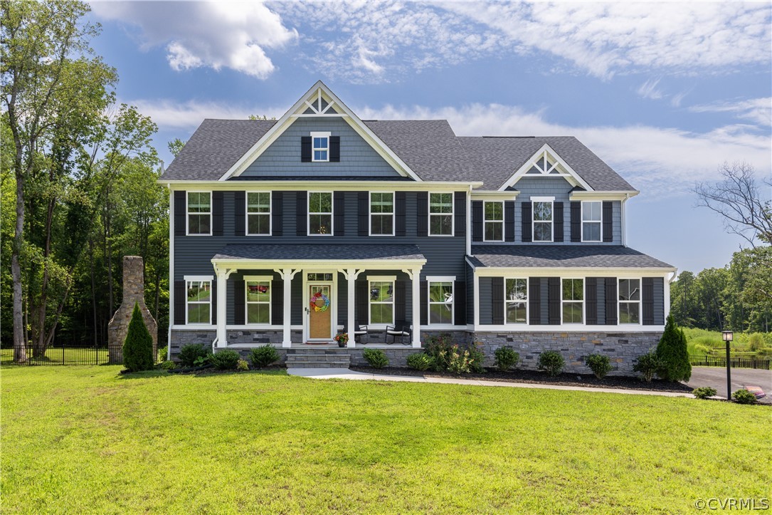 front view of a house with a yard