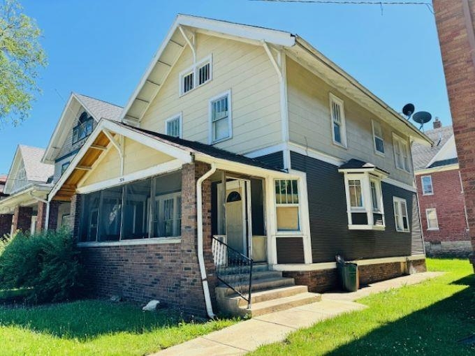 front view of house with a yard