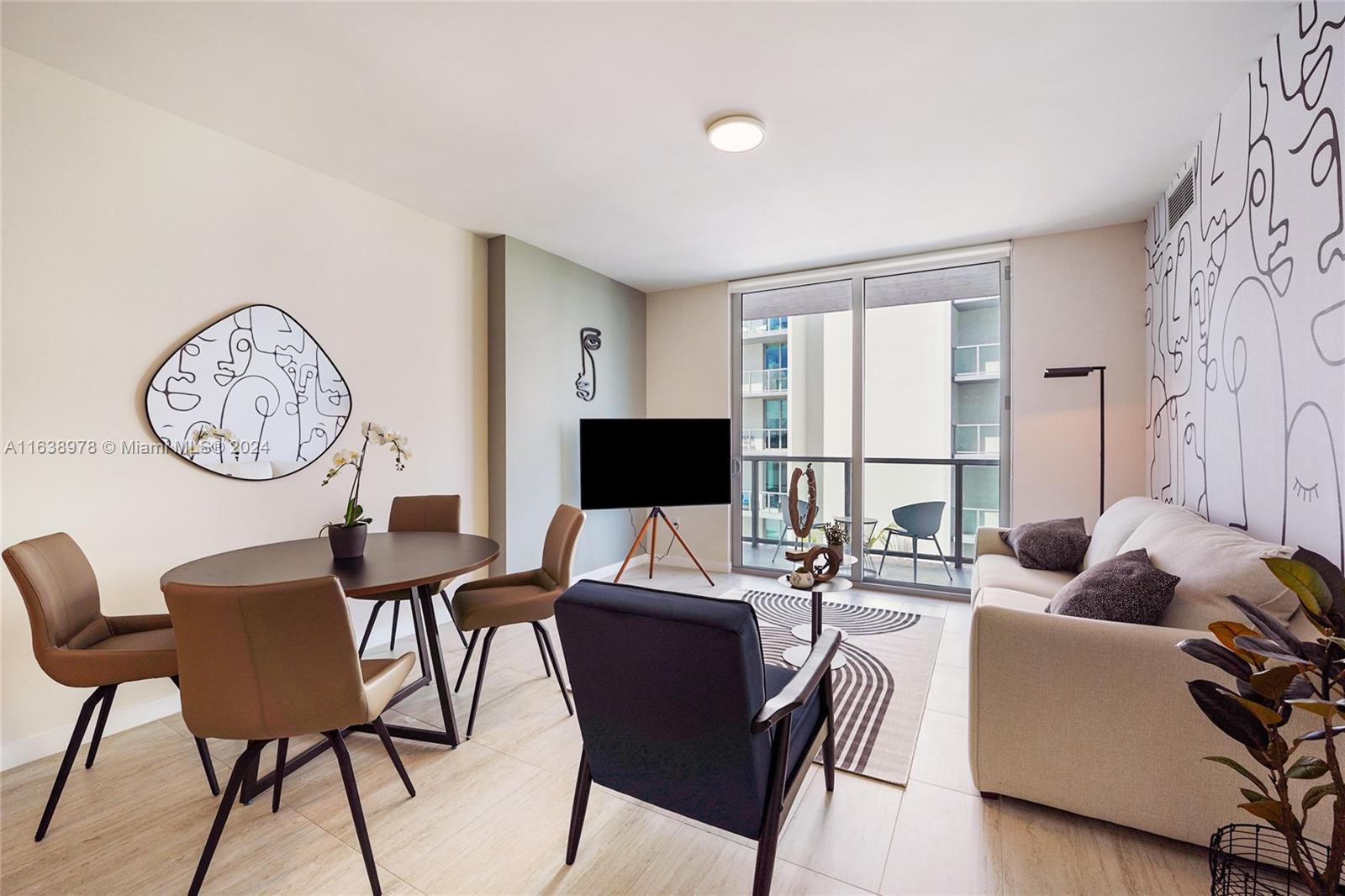 a living room with furniture or couch and a flat screen tv