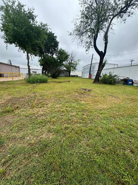 a view of a yard with a slide