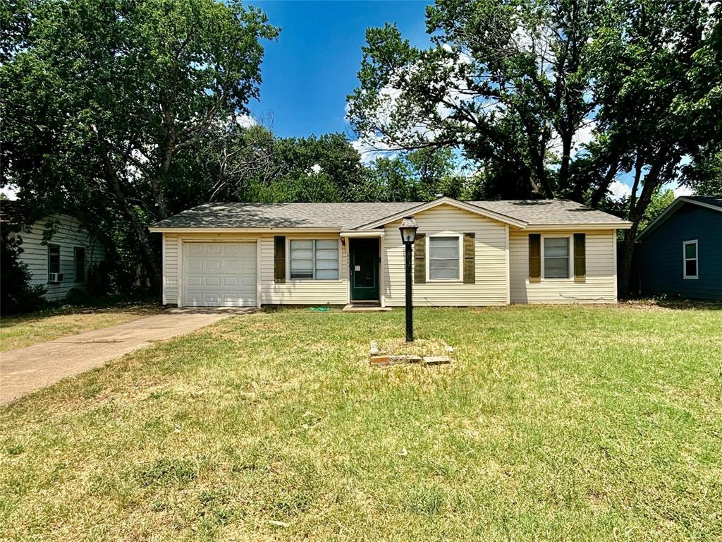 a house with trees in the background