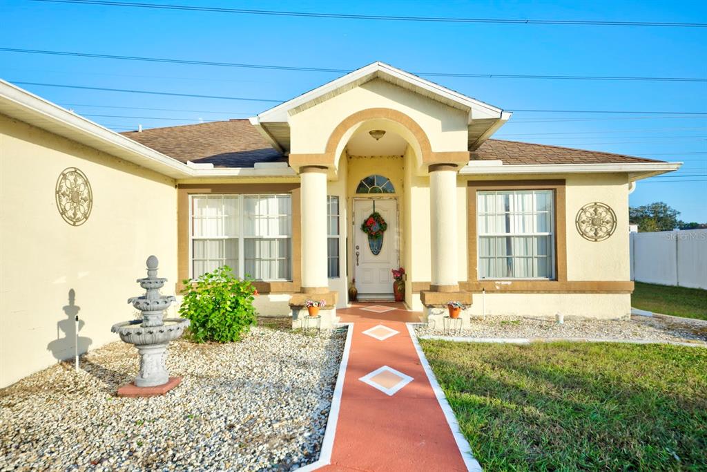 a front view of a house with a porch