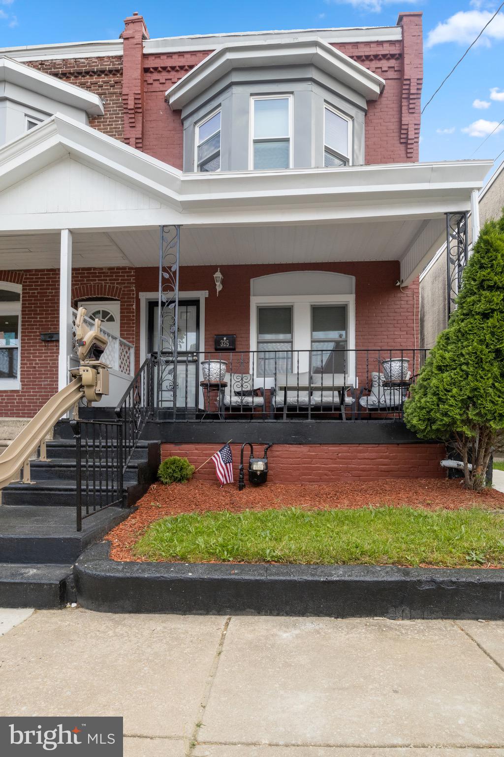 front view of house with a yard