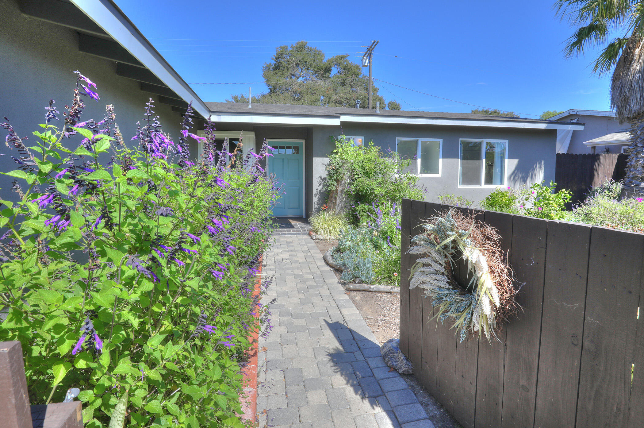 Exterior: fenced front yard