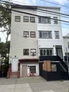 a front view of a house with a garage