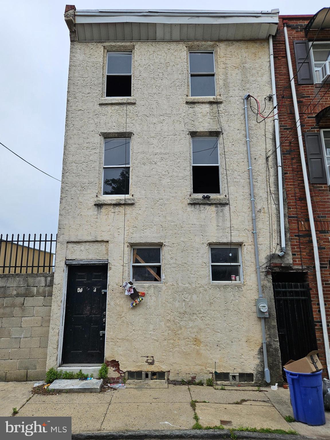 a front view of a house with stairs