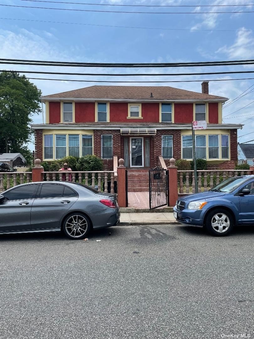 a car parked in front of a house