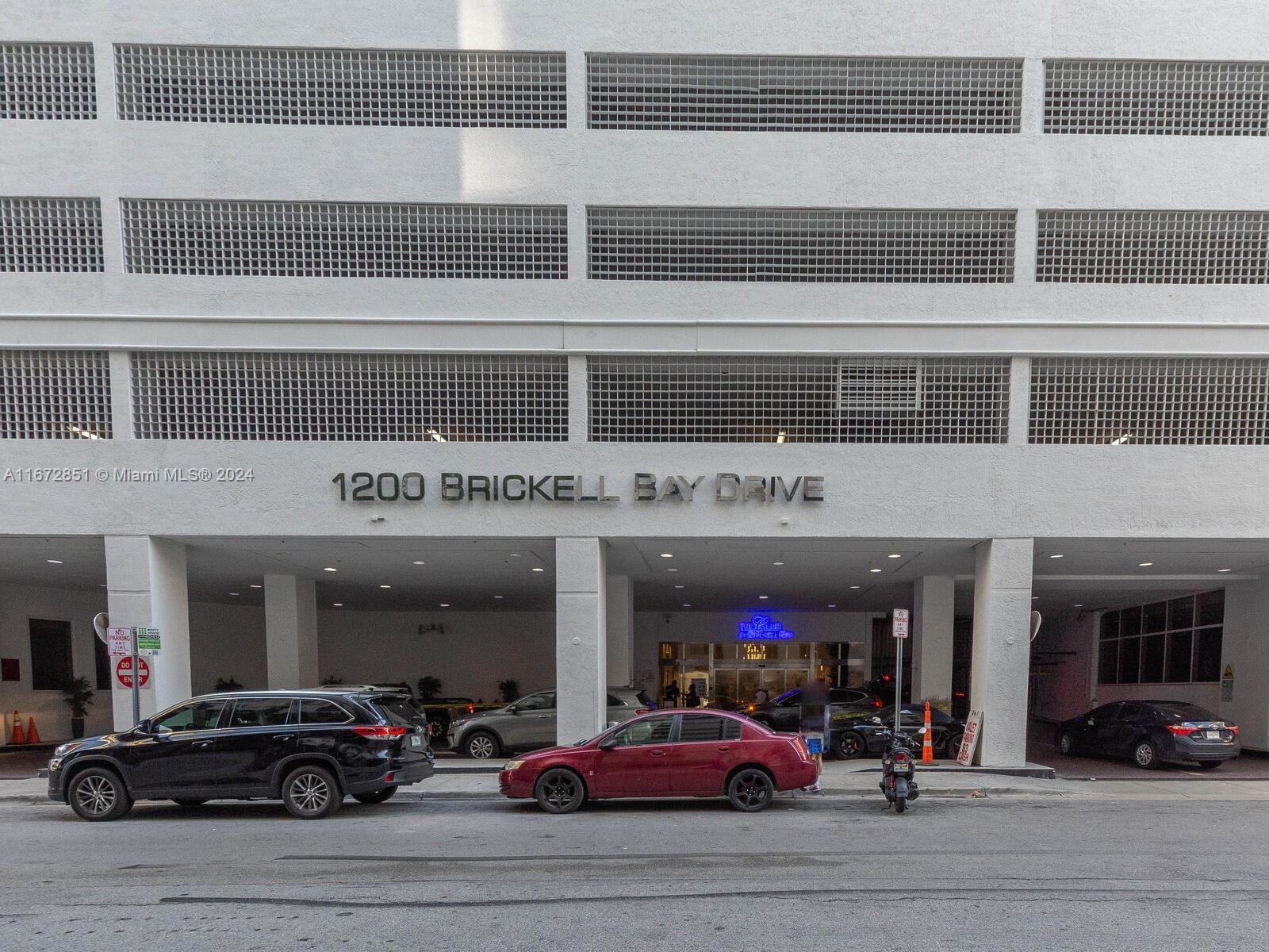 a view of a building with car windows