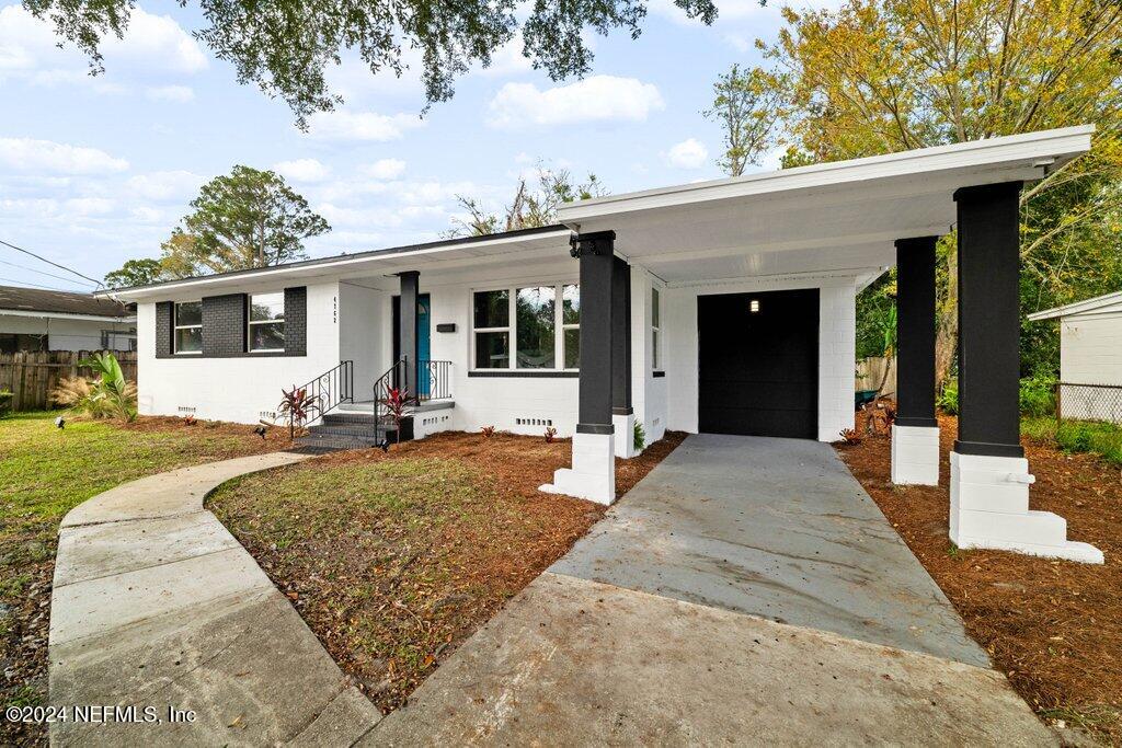 a view of a house with a patio