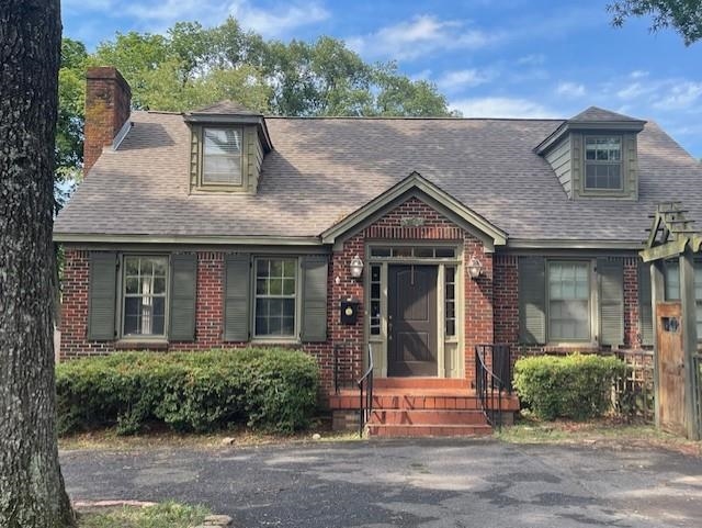 front view of house with a yard