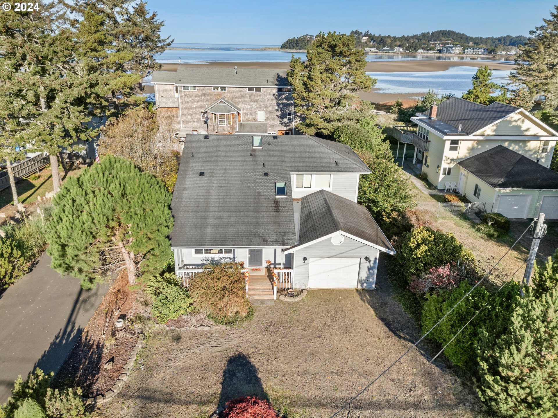 an aerial view of a house with outdoor space