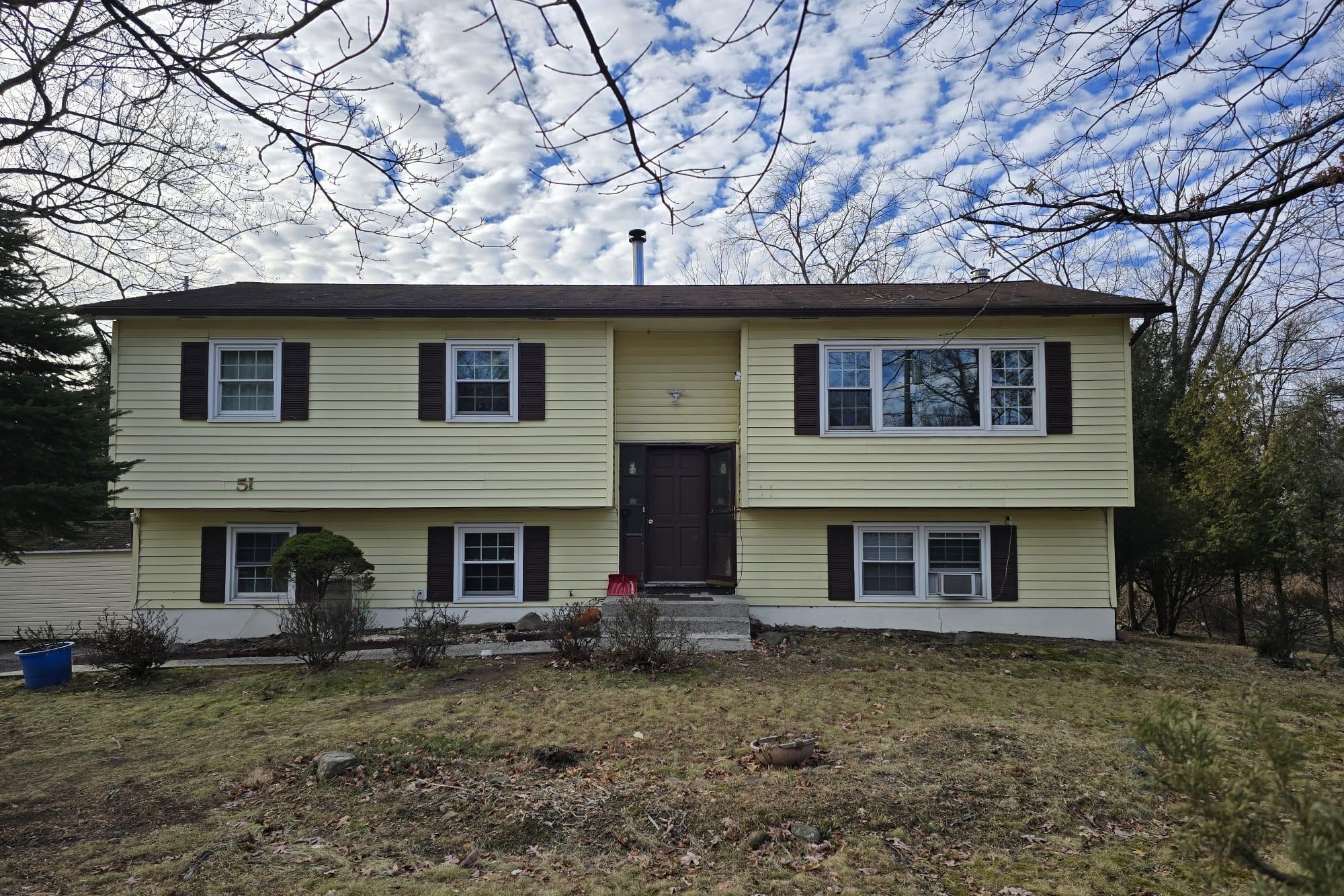 View of split foyer home