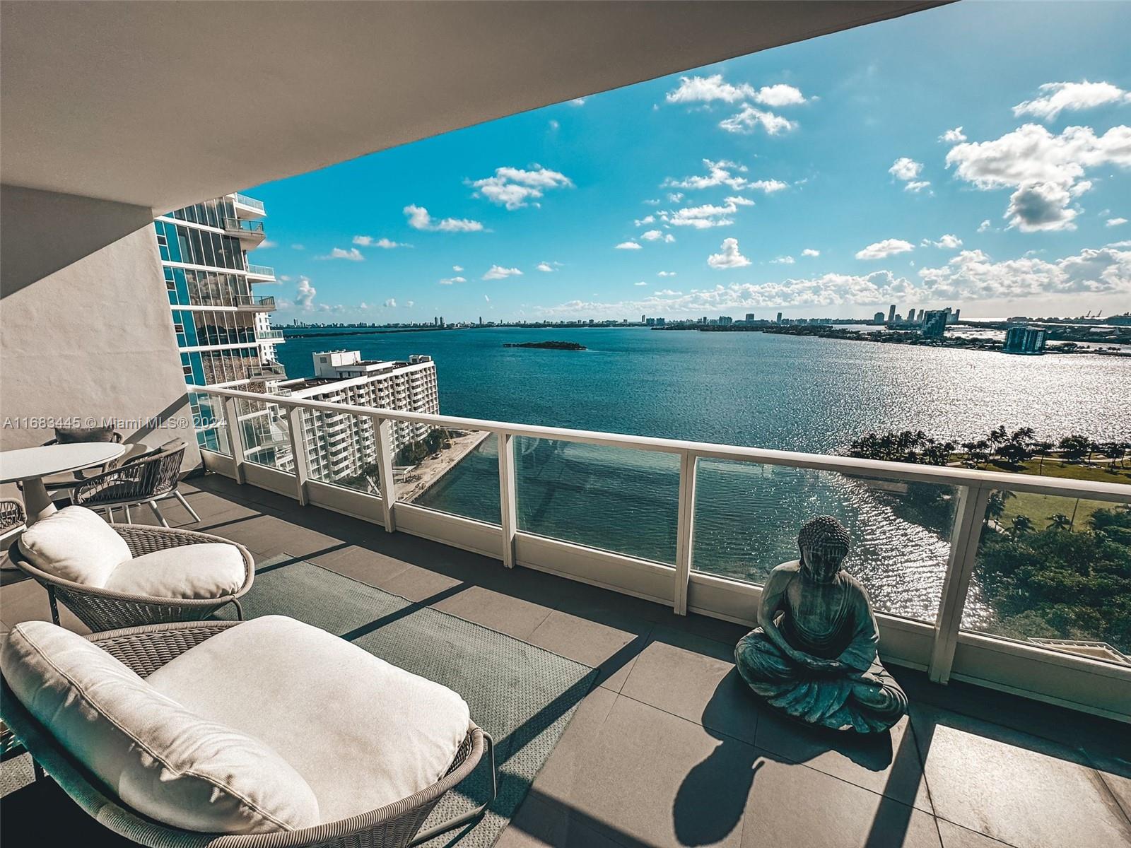 a view of a balcony with seating space