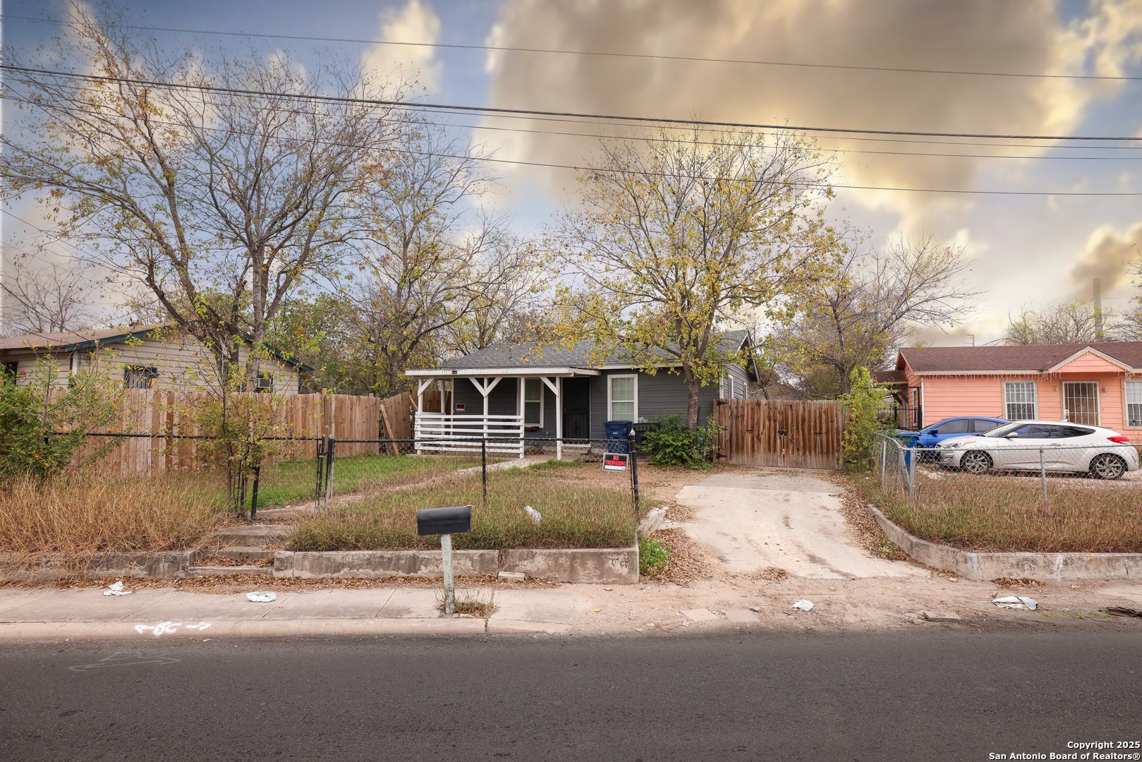 a view of a street with a house