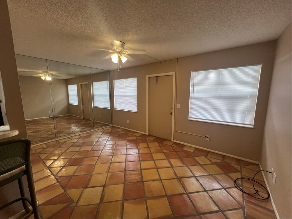 a view of an empty room and window