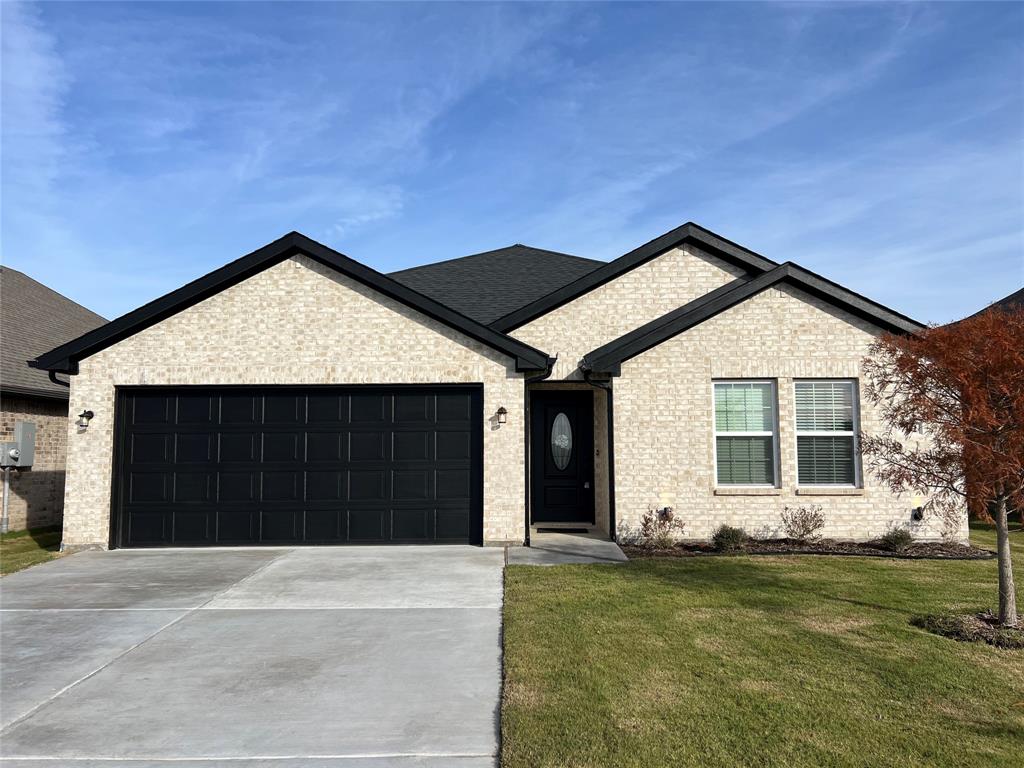 a front view of house with yard