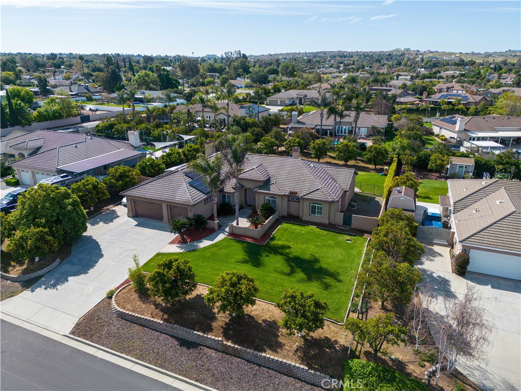 an aerial view of a house with a garden