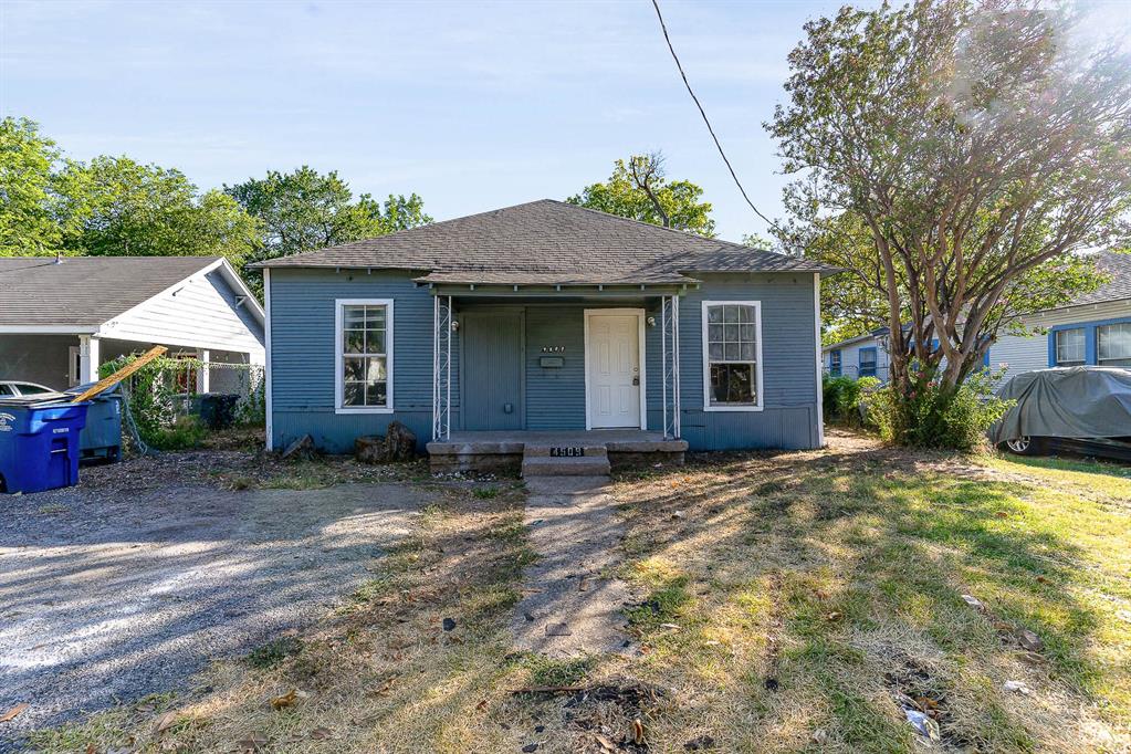 a house with yard in front of it