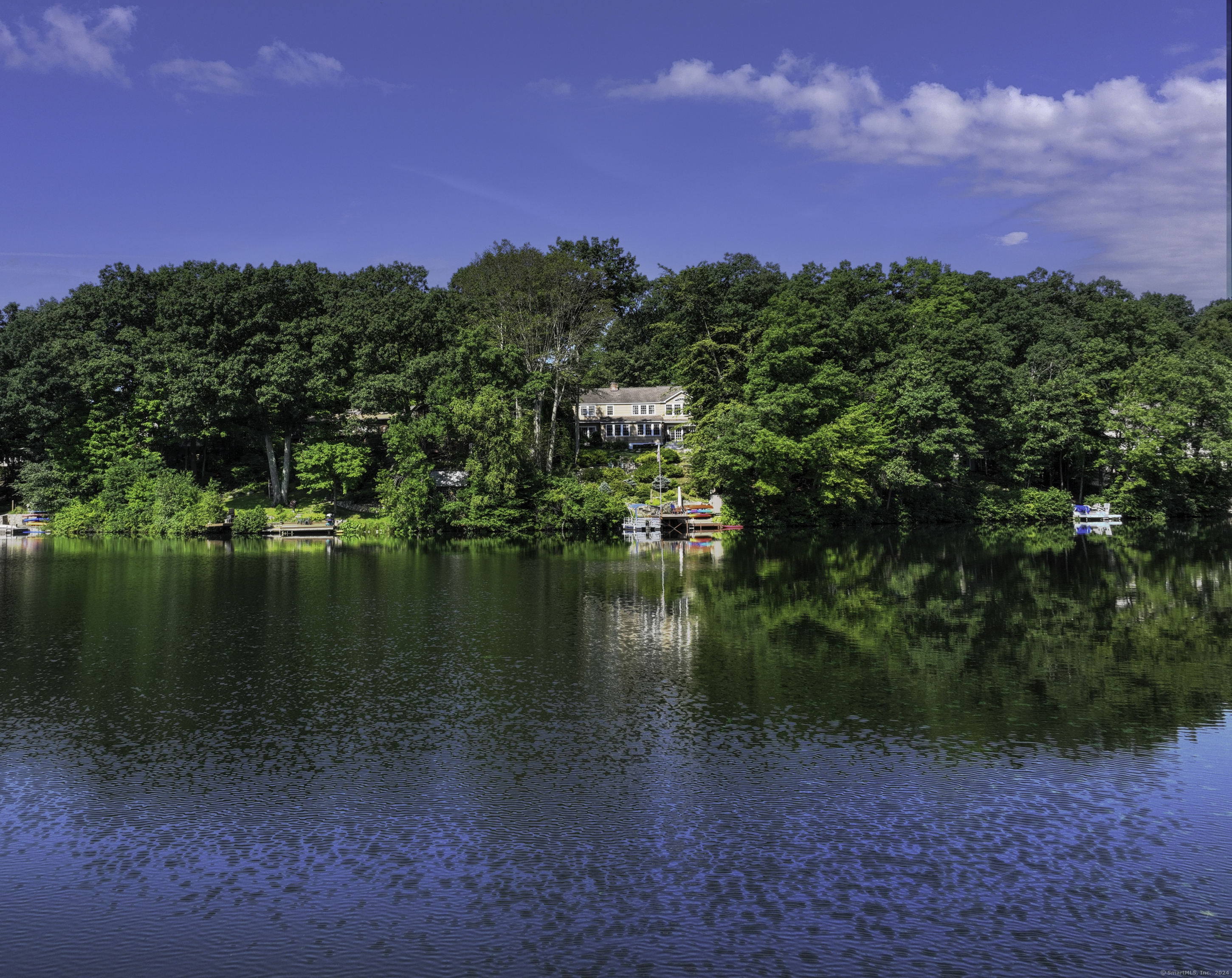 a view of a lake with a city